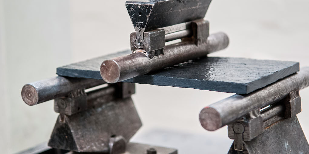 Three-point flexural strength test to ASTM standards